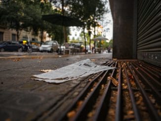 newspaper near garage door