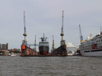 white and brown ship on sea during daytime