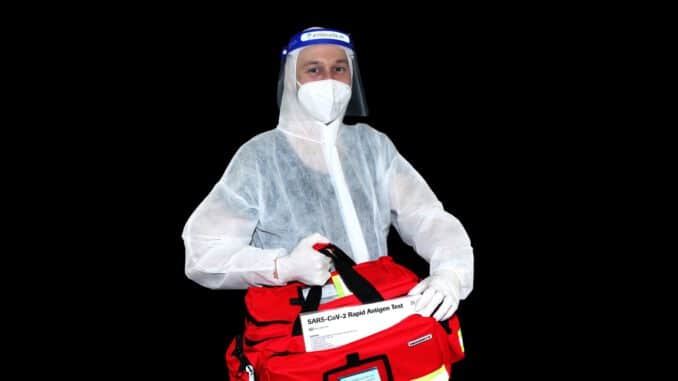 man in white hoodie and blue helmet