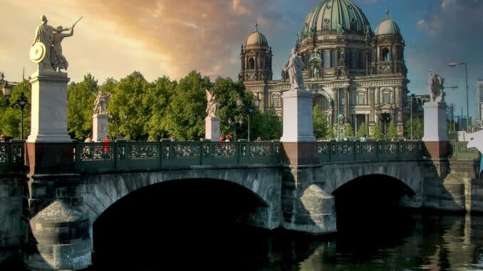 1700248552_bridge-river-church-architecture-5610923.jpg